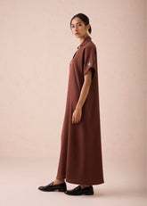 A Model Wearing Brown Organic Cotton The Mountainside Organic Cotton Collar Maxi Dress, curated by Only Ethikal